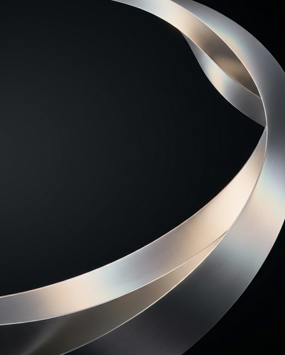 Abstract silver and champagne ribbon of light curving through darkness
